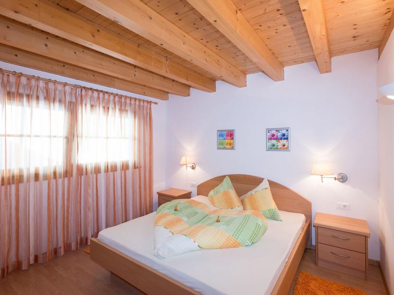 Ferienwohnung Wildbach – Schlafzimmer mit Doppelbett